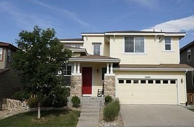 Charming two-story curb appeal with attached two-car garage.