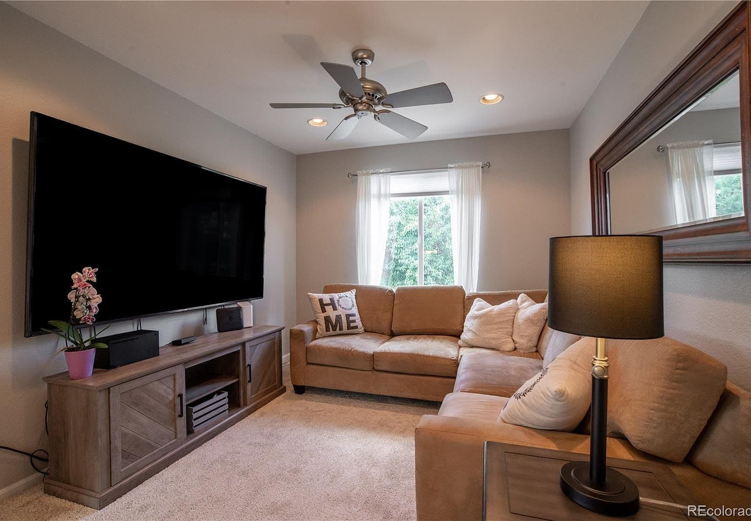 Cozy loft media space, perfect for movie nights.