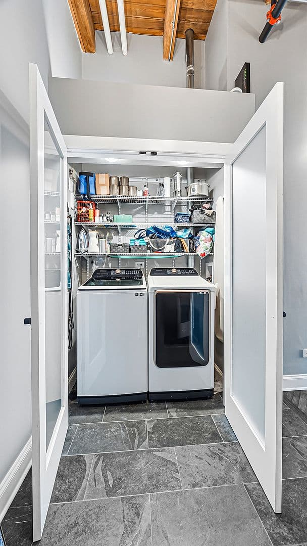 Concealed laundry closet with full-size washer and dryer