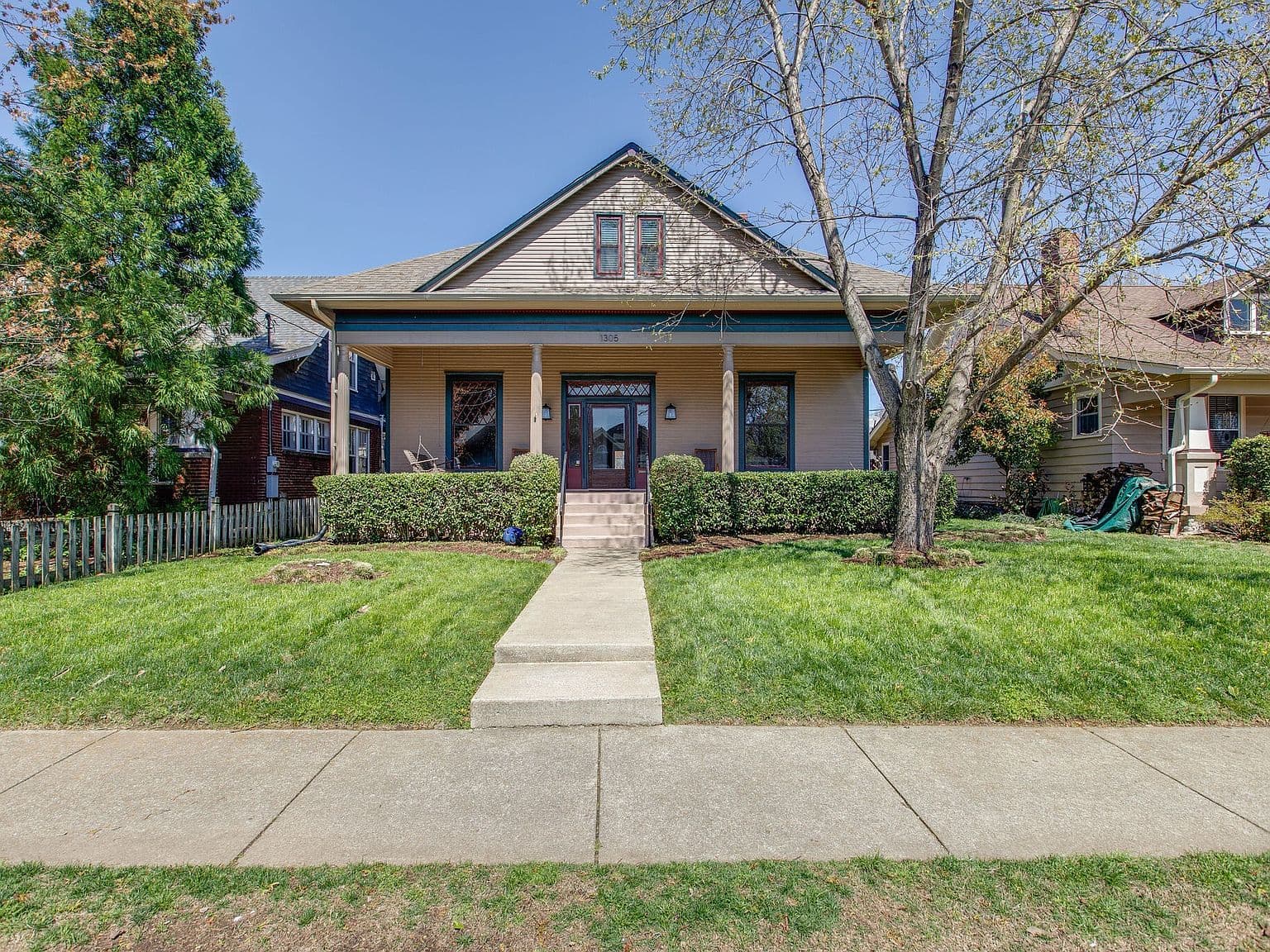 Storybook East Nashville porch-front home with timeless curb appeal.