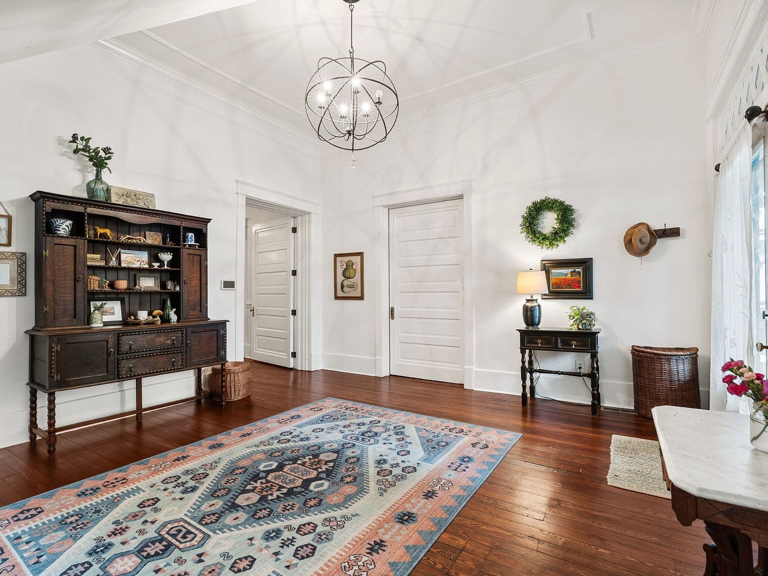 Classic details meet modern style in this grand front room.