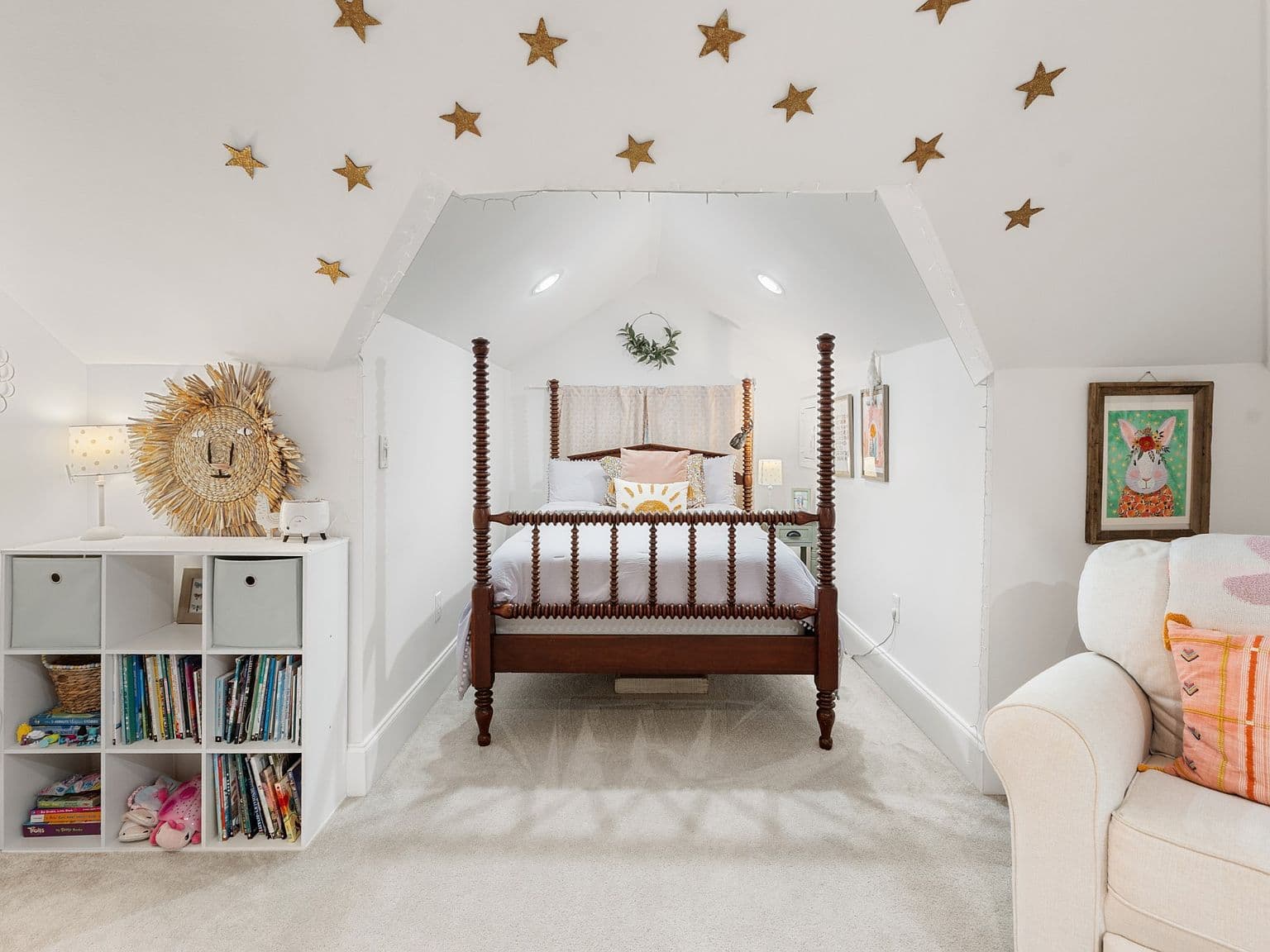 Charming upstairs bedroom nook with whimsical star ceiling.