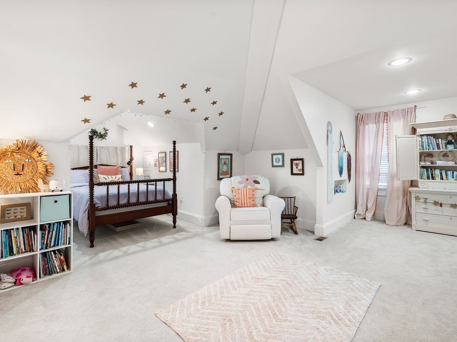 Spacious upstairs retreat with reading nook and built-ins.