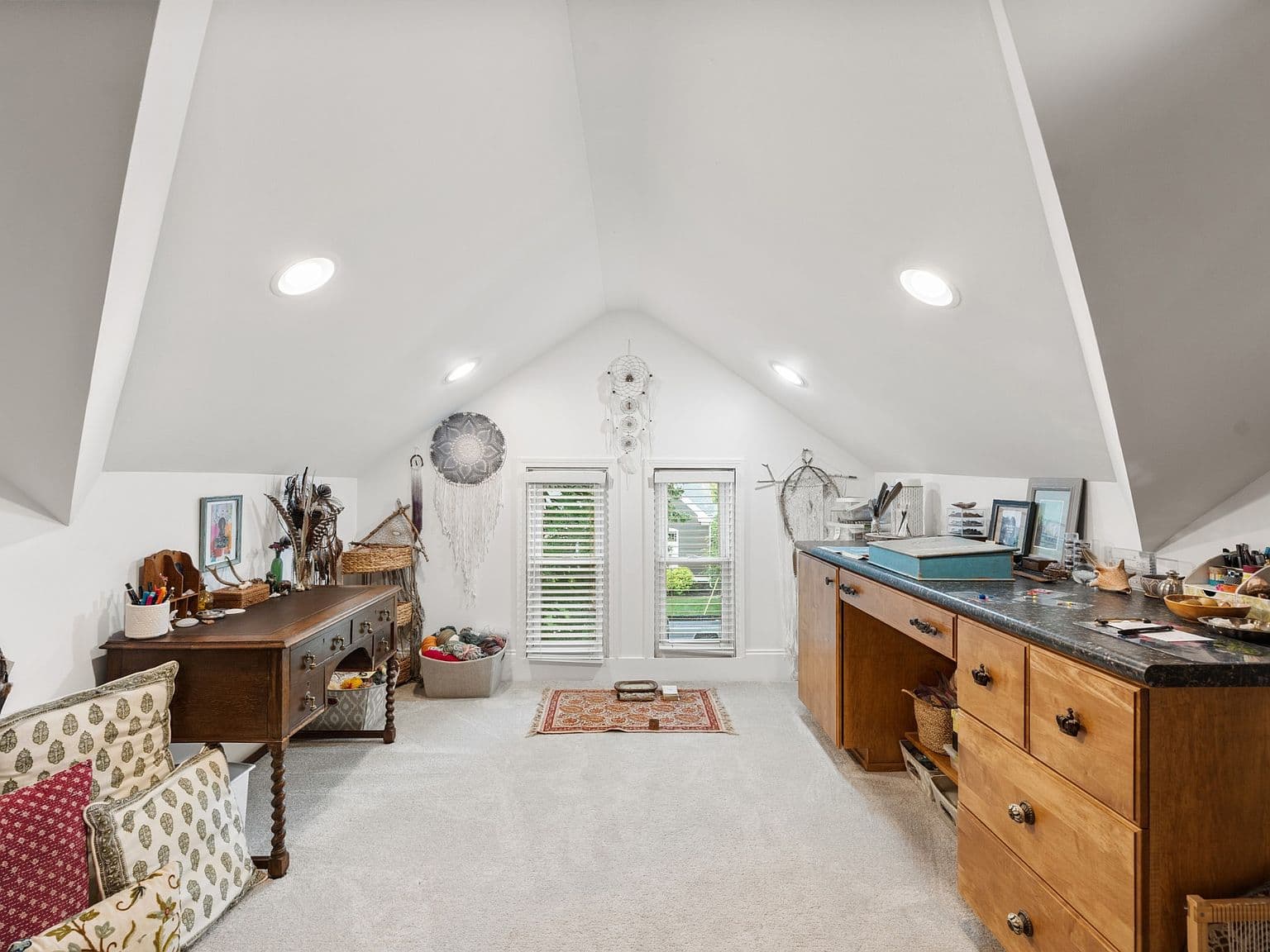 Oversized upstairs bonus room ideal for studio or playroom.