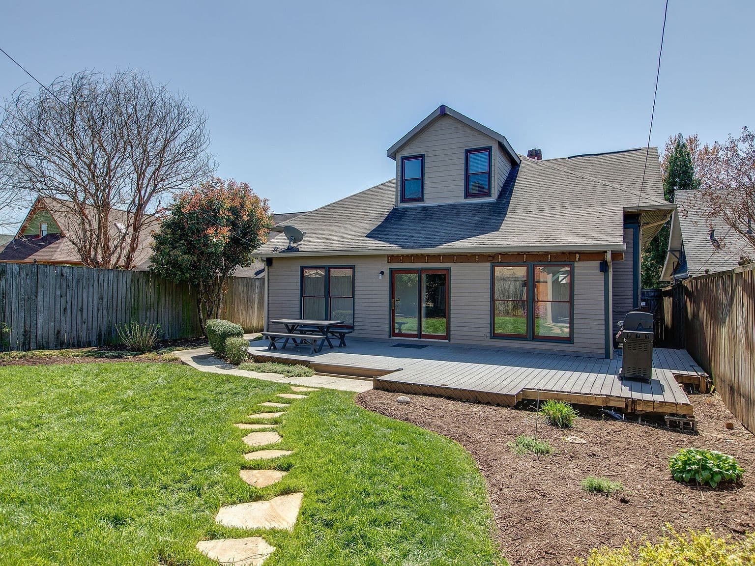 Spacious deck and yard ideal for effortless entertaining.