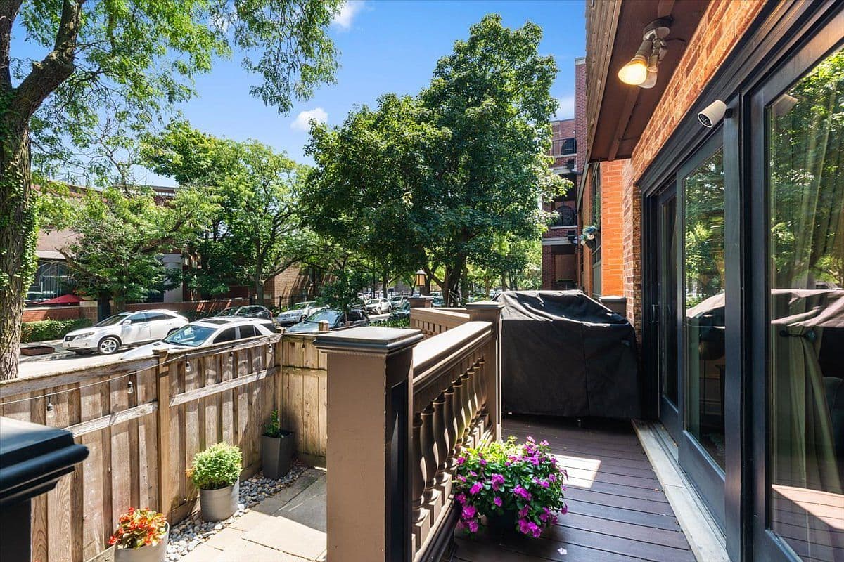 Tree-lined deck and patio for grilling and al fresco dining.