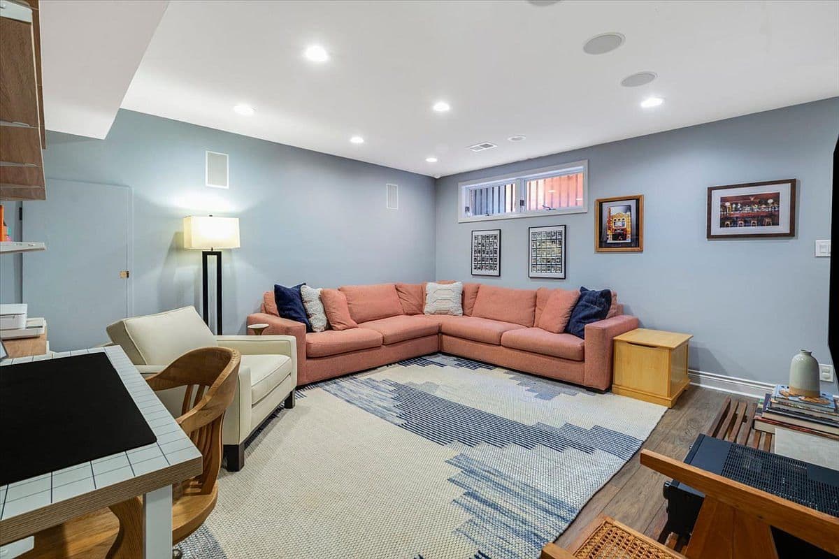 Spacious lower-level rec room for relaxing and entertaining.