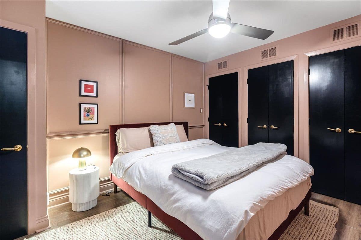 Cozy third bedroom with abundant closet storage.