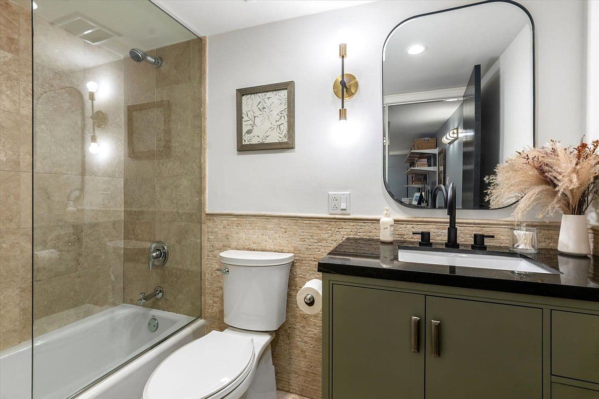 Spa-inspired bath with sleek vanity and glass shower.