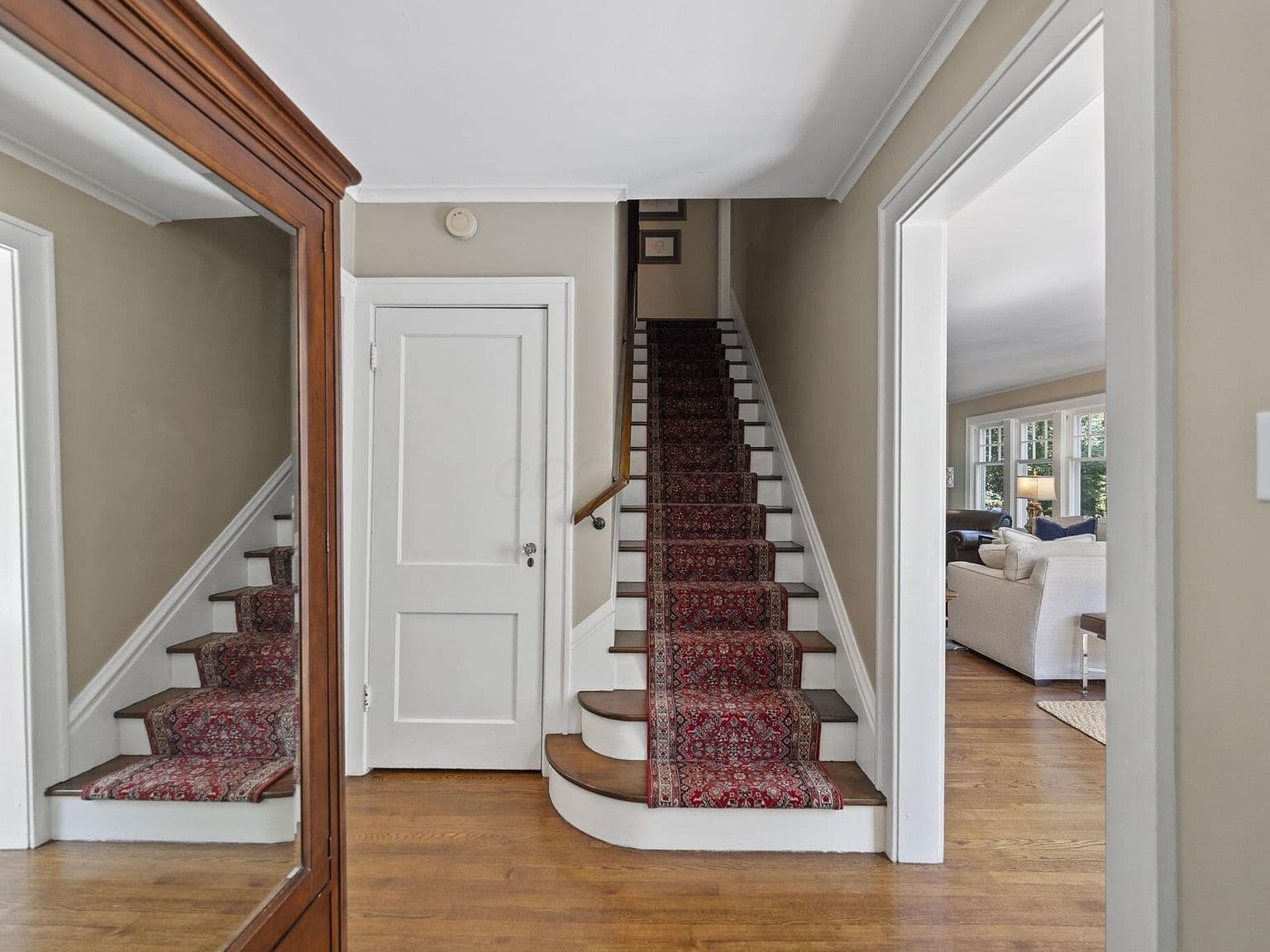 Bright bay-window nook with built-in storage bench seating.