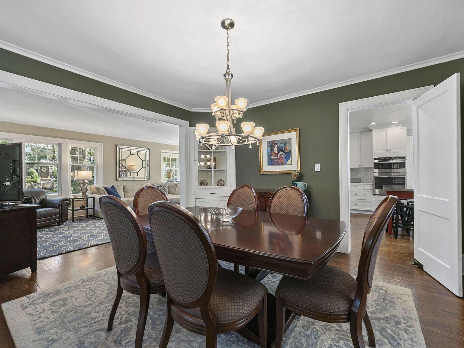 Open dining area flows seamlessly to living room and kitchen.