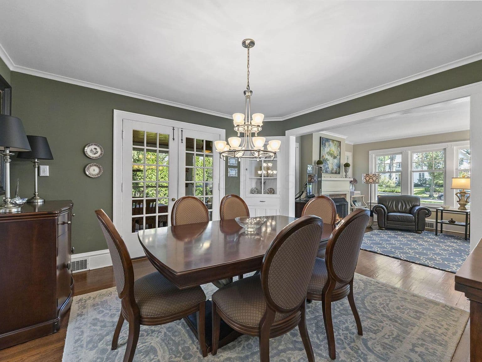 Elegant dining space with built-ins and airy sightlines.