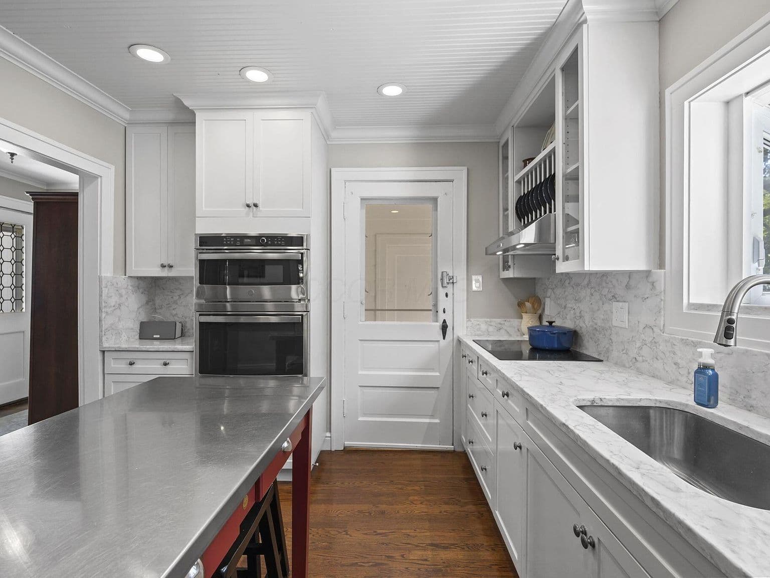 Stainless double ovens and generous counters for entertaining.