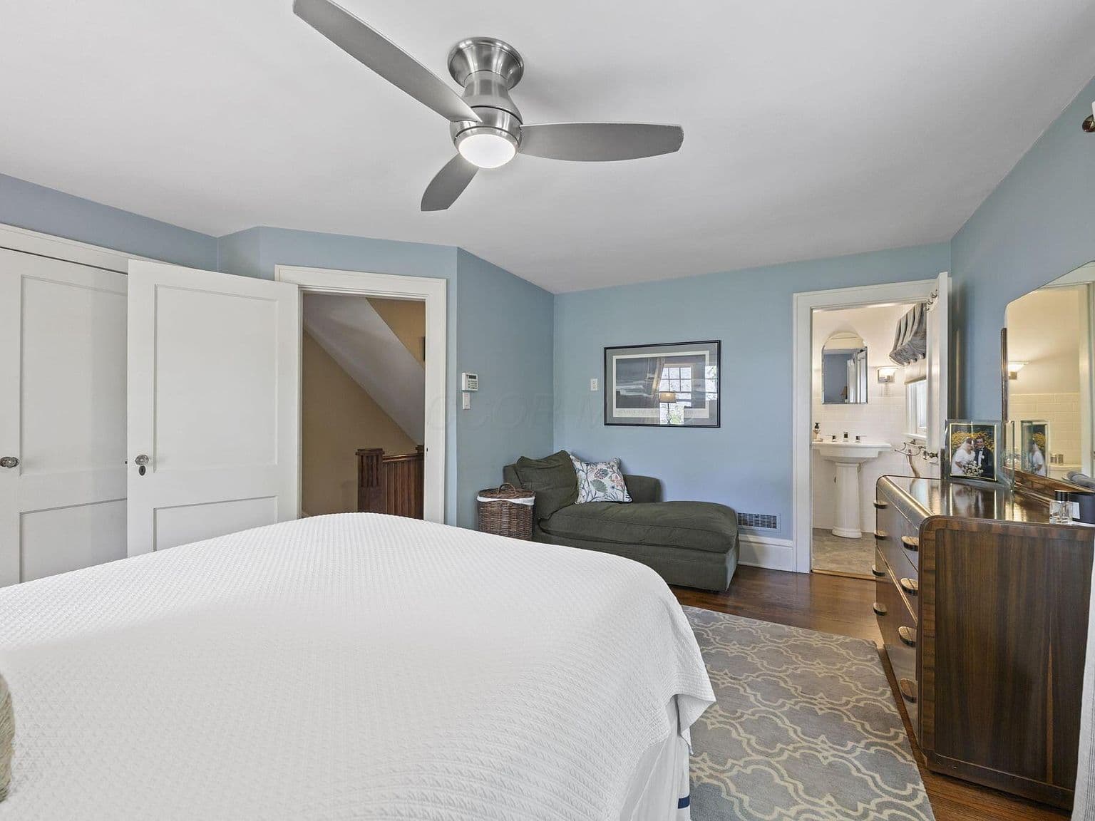 Relaxing bedroom retreat steps from updated bath.