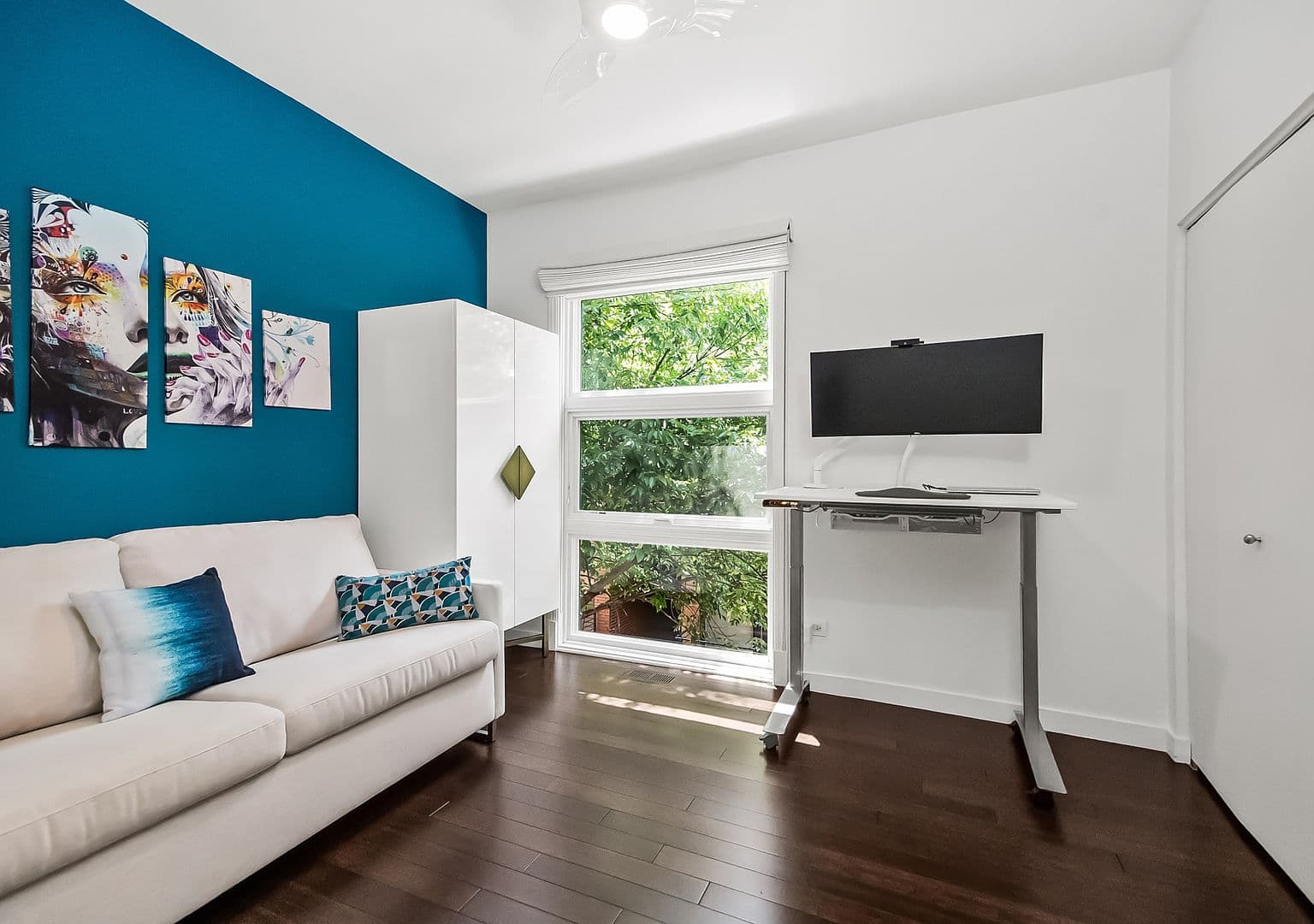 Bright flex room perfect for office, gym, or theater.