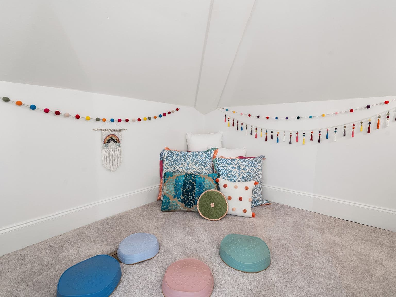 Charming tucked-away alcove for play, study, or storage.