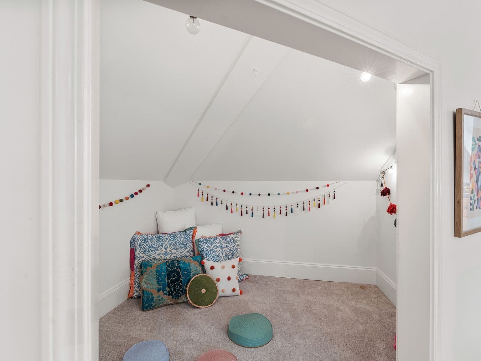 Whimsical loft bedroom with starry ceiling accents.