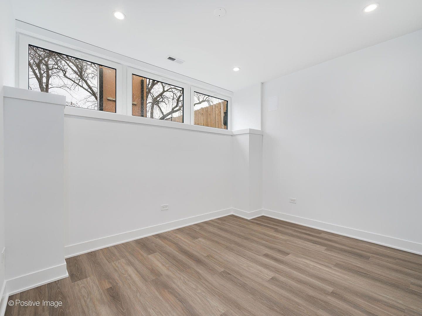 Versatile lower-level room with clerestory windows