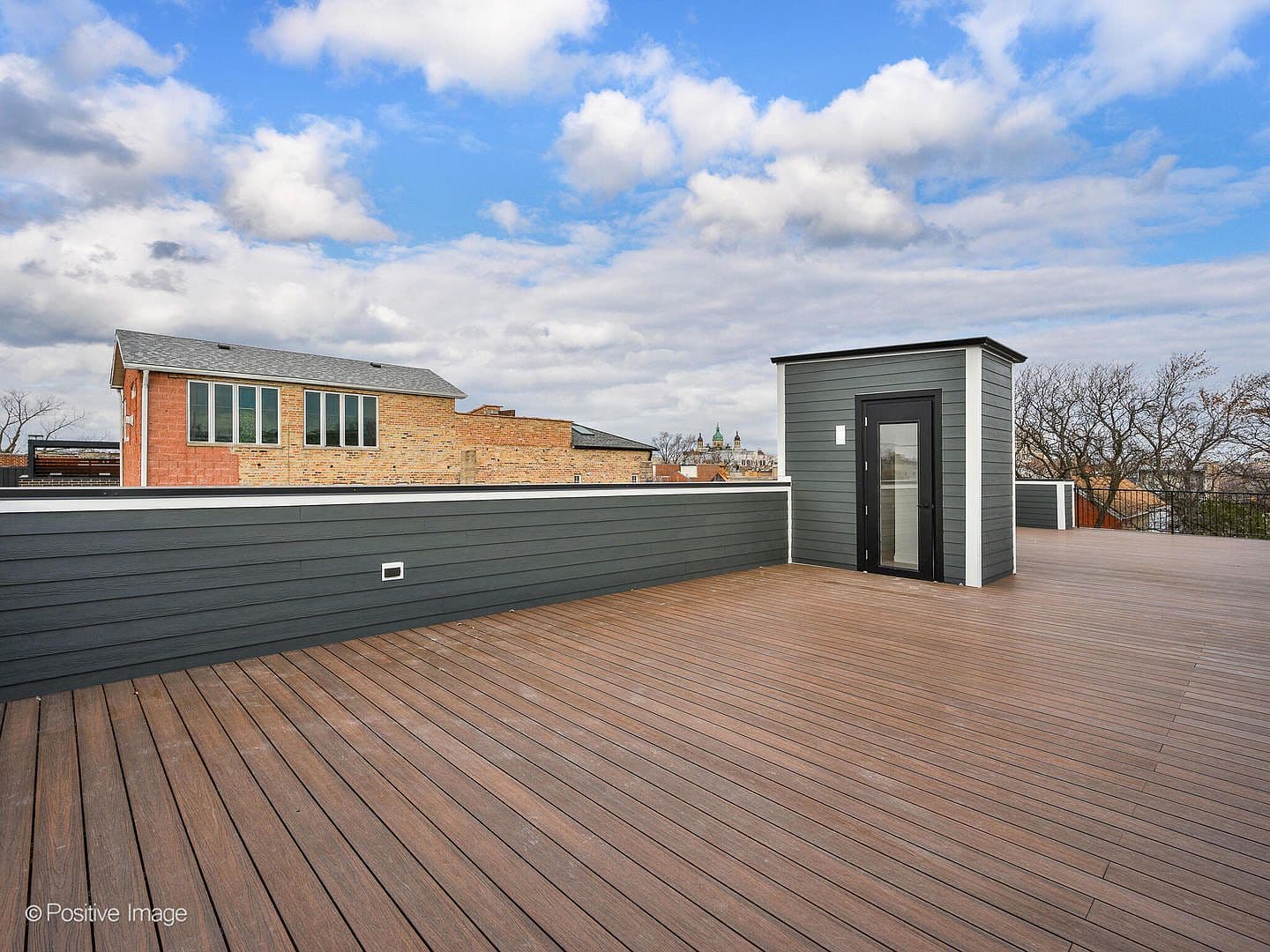 Rooftop deck with interior stair access enclosure