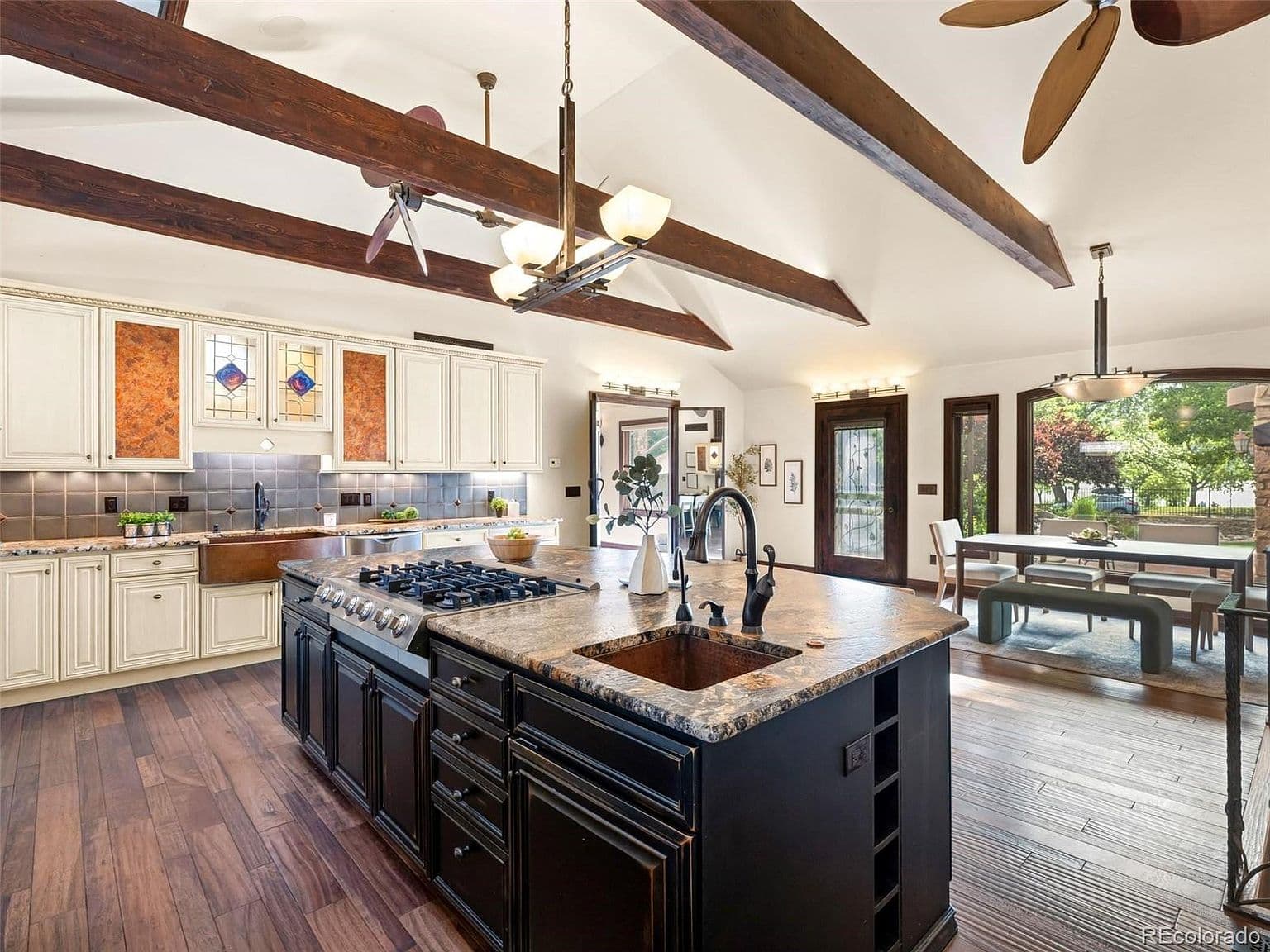 Bright kitchen flows effortlessly into the dining area