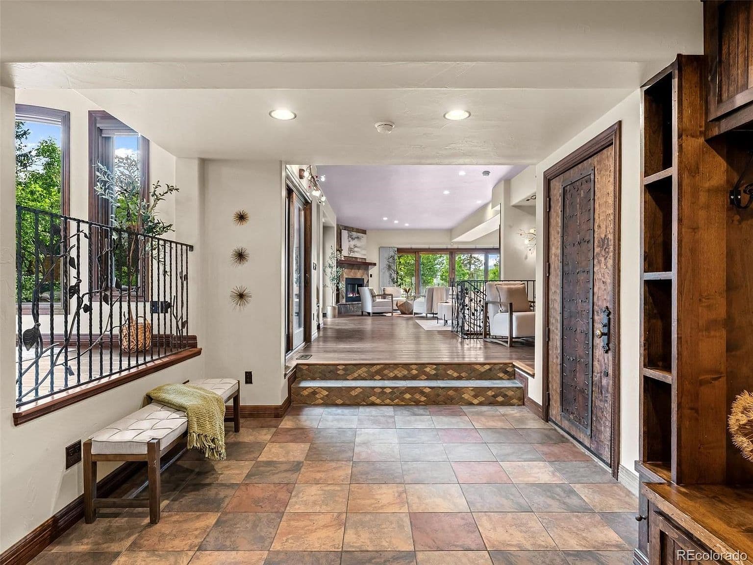 Welcoming tiled entry opens to the spacious living room