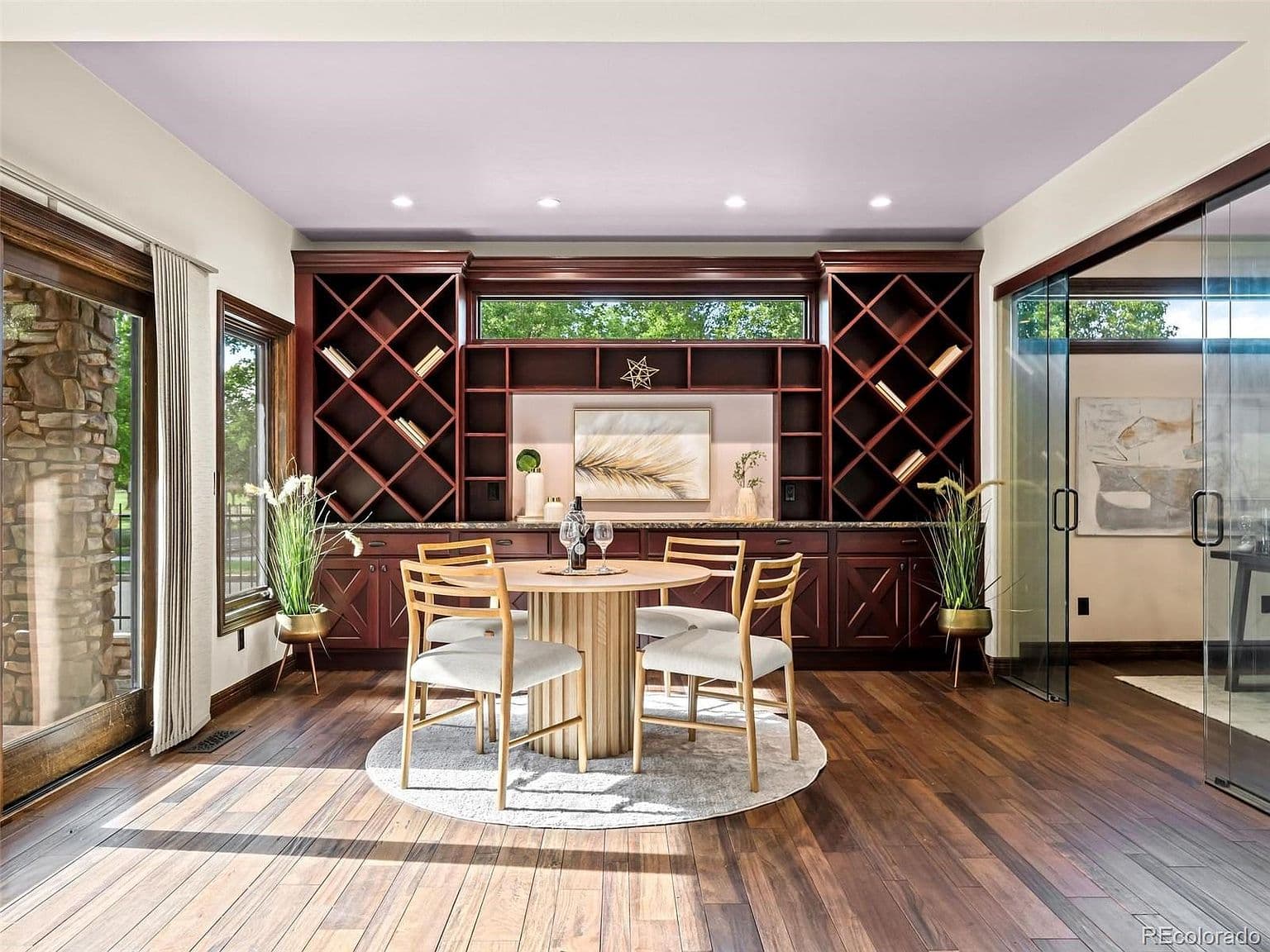 Custom cabinetry brings warmth and storage to the dining area