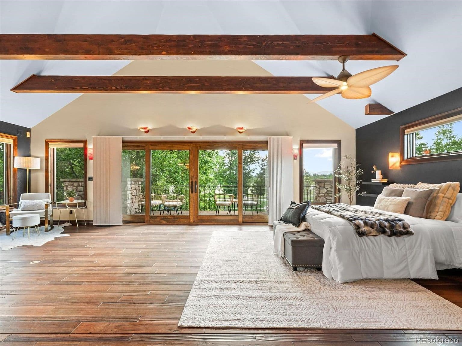 Expansive upstairs owner’s suite opens to a scenic balcony