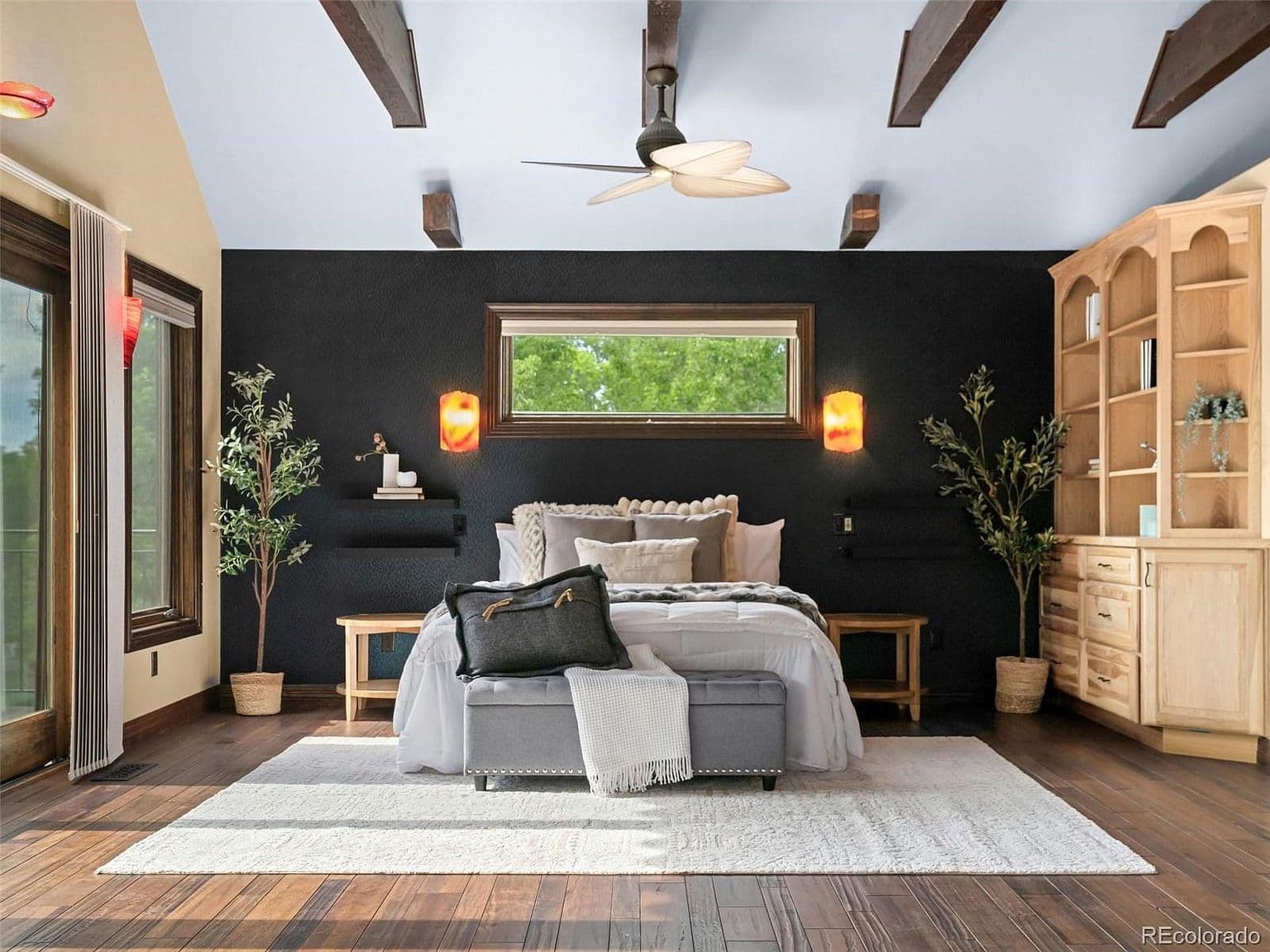 Upstairs suite pairs dramatic accents with built-in cabinetry