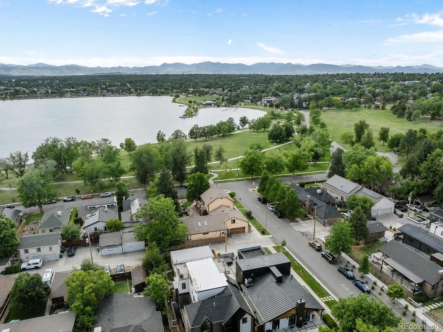 Lakeside park and mountain scenery frame the neighborhood