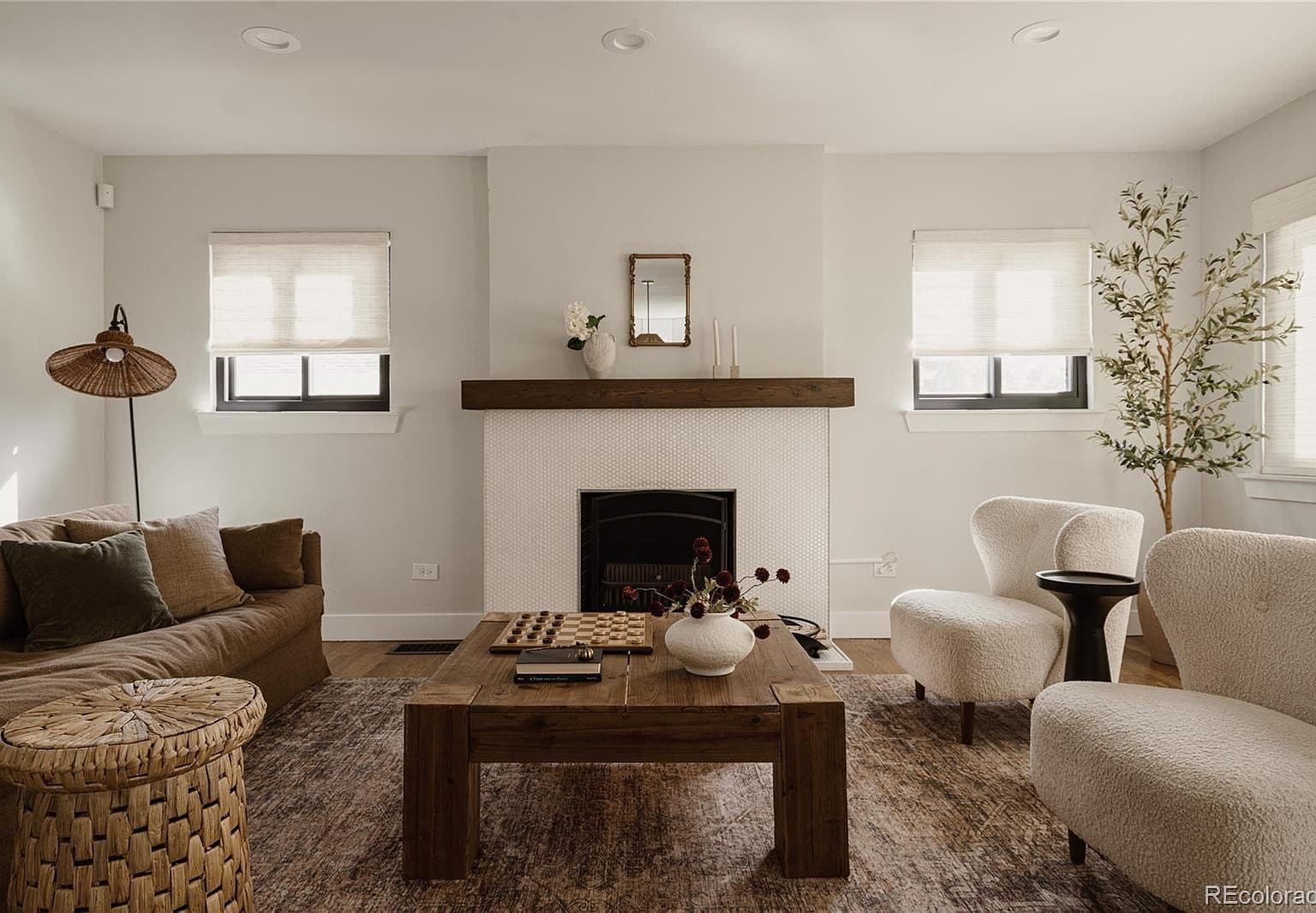Living room fireplace anchors a warm, inviting gathering space