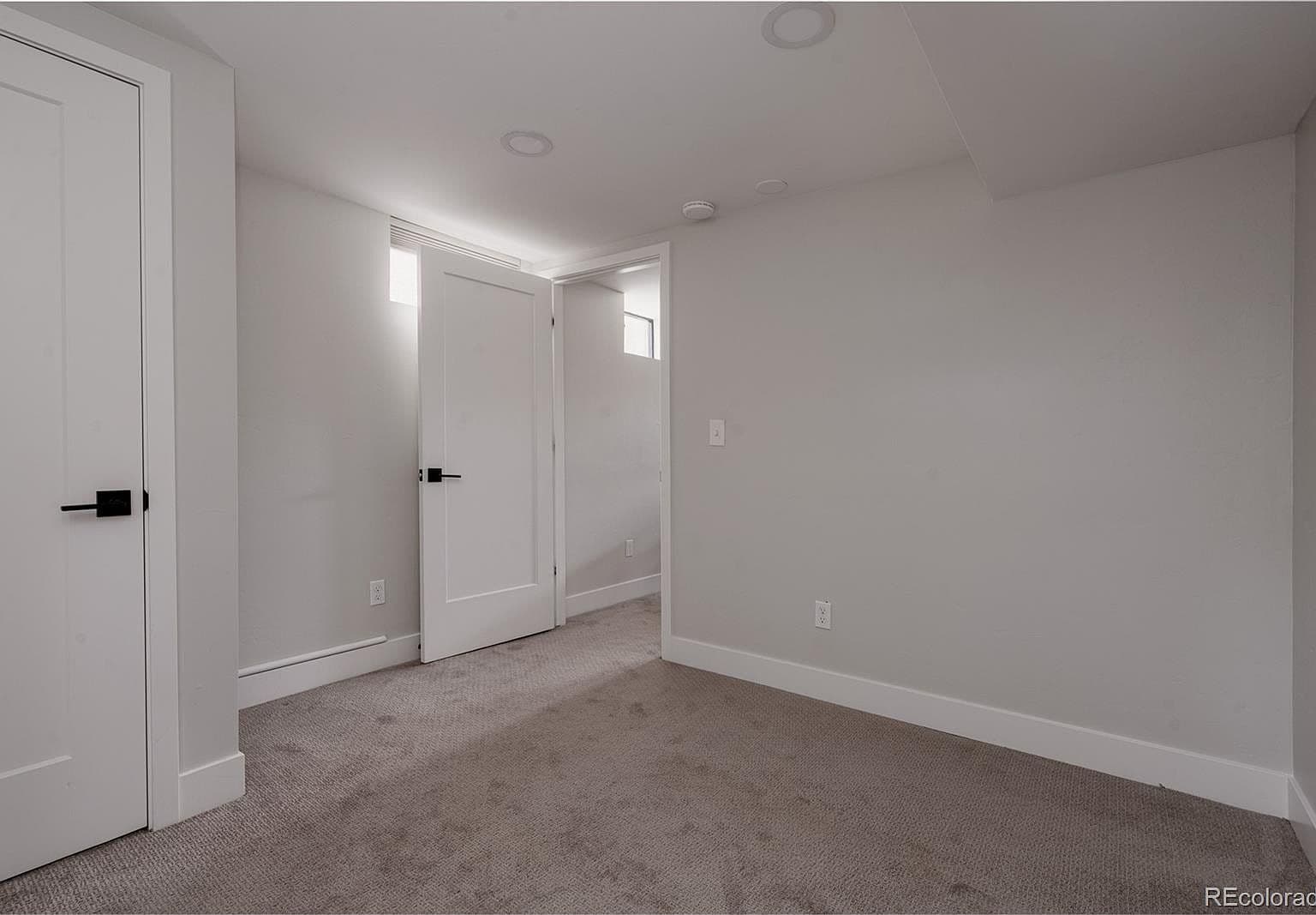 Versatile carpeted room ready for your personal touch.