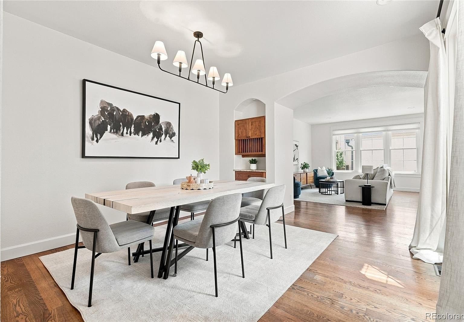 Spacious dining room flows seamlessly to living area.