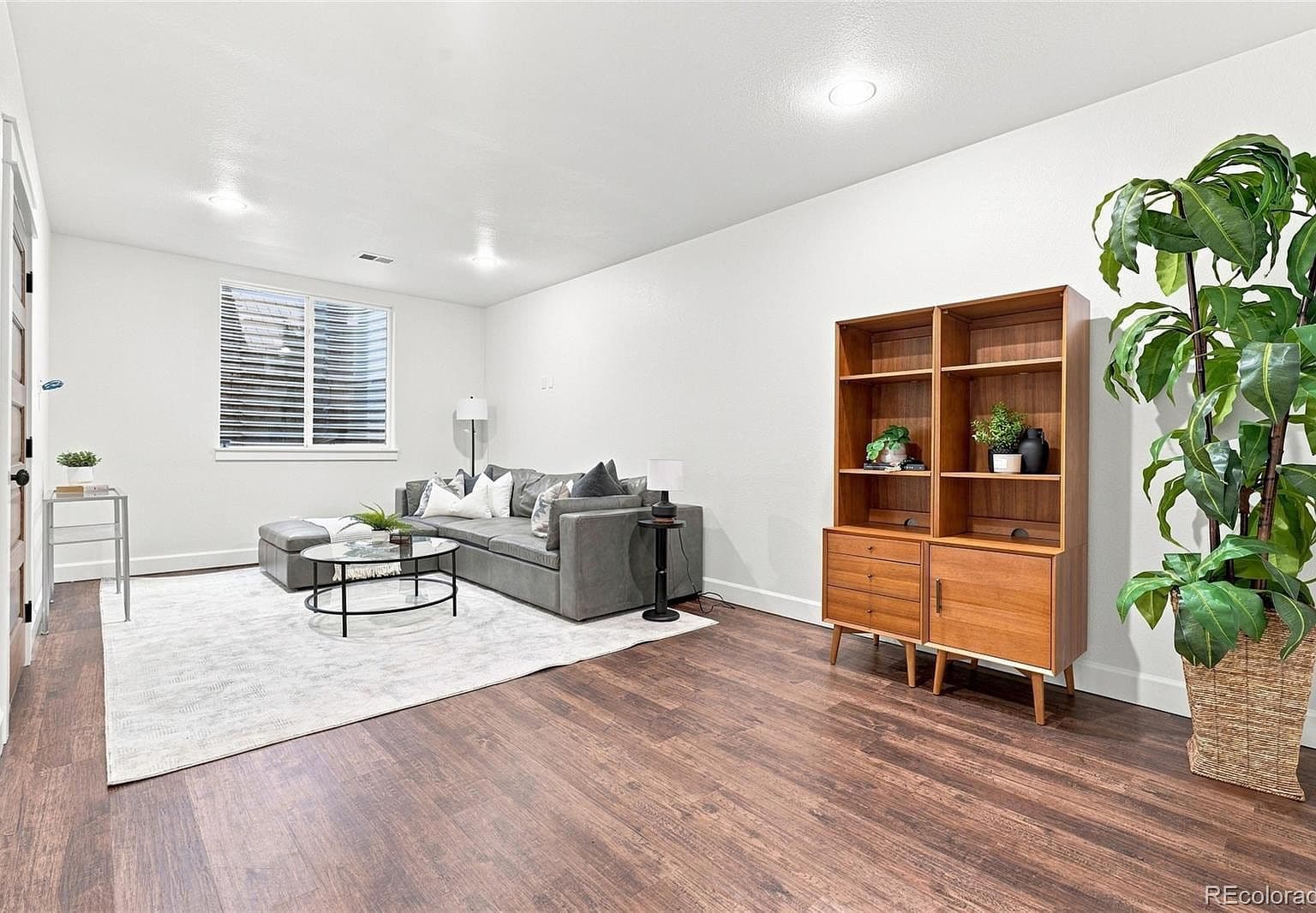 Spacious lower-level living area, perfect for movie nights.