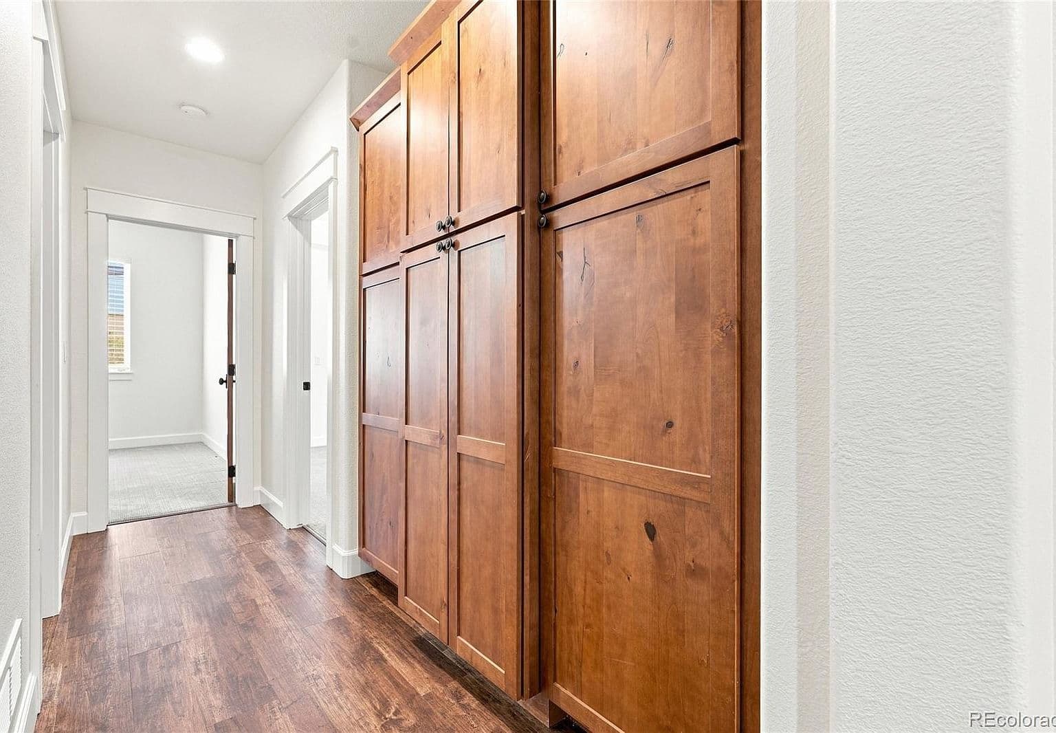 Custom built-in storage keeps everyday life beautifully organized.