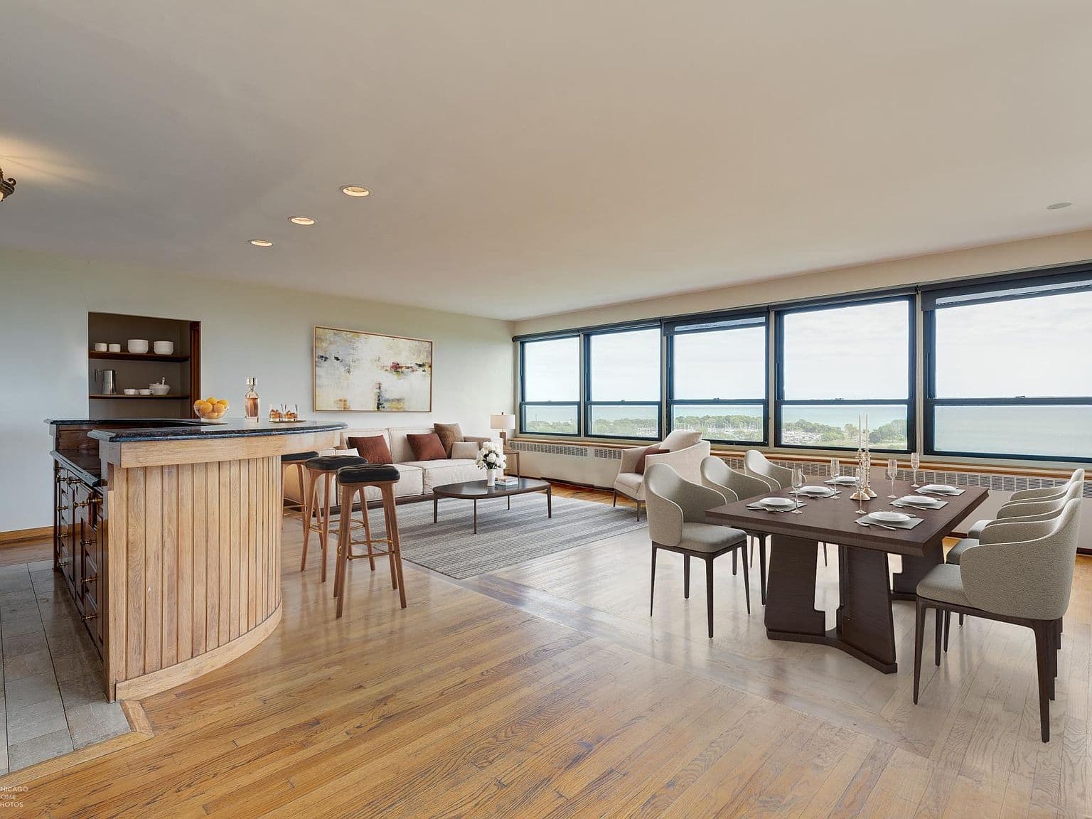 Open living and dining areas frame sweeping lake views.