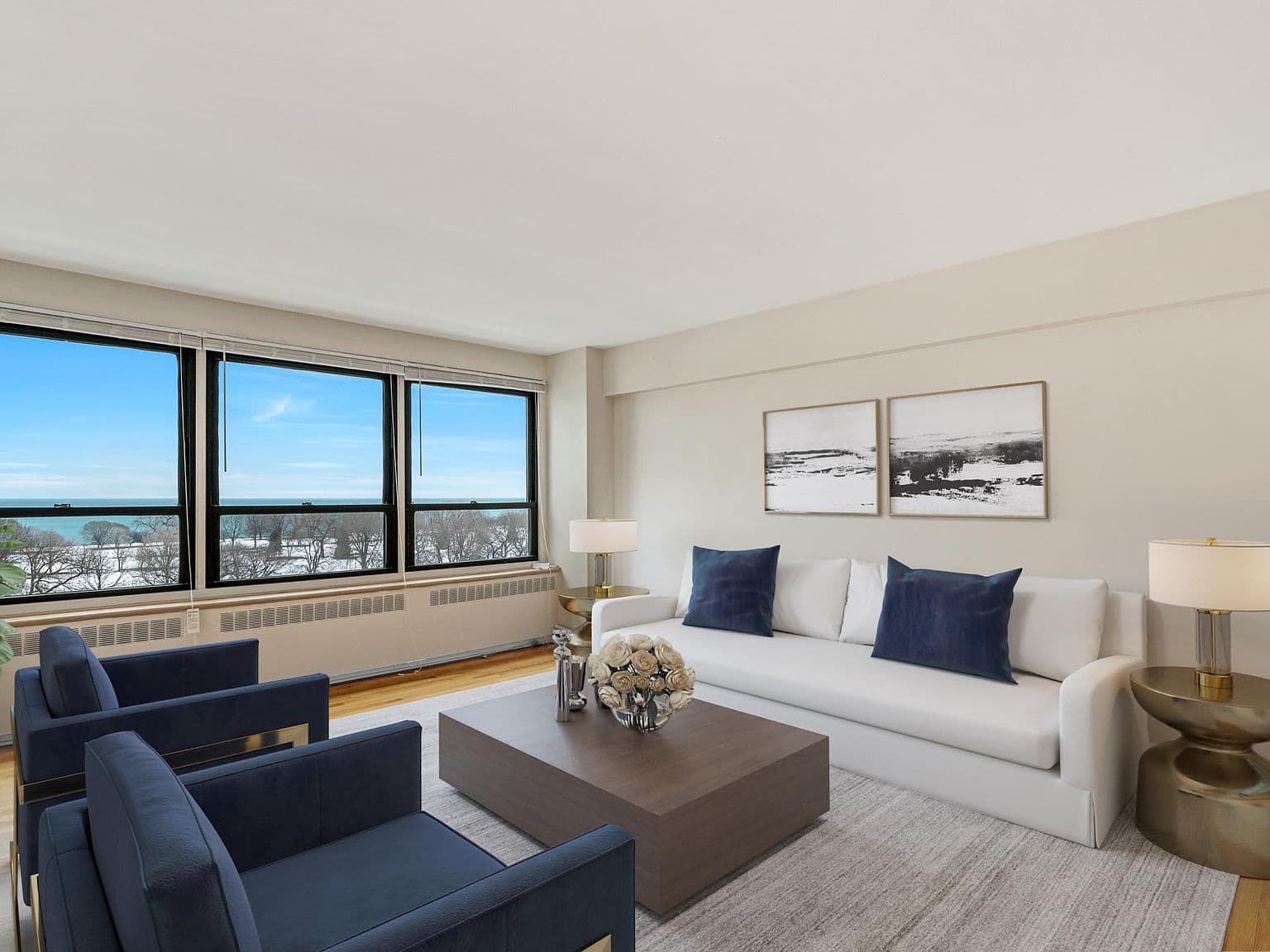 Sunlit living room frames an east-facing Lake Michigan outlook.