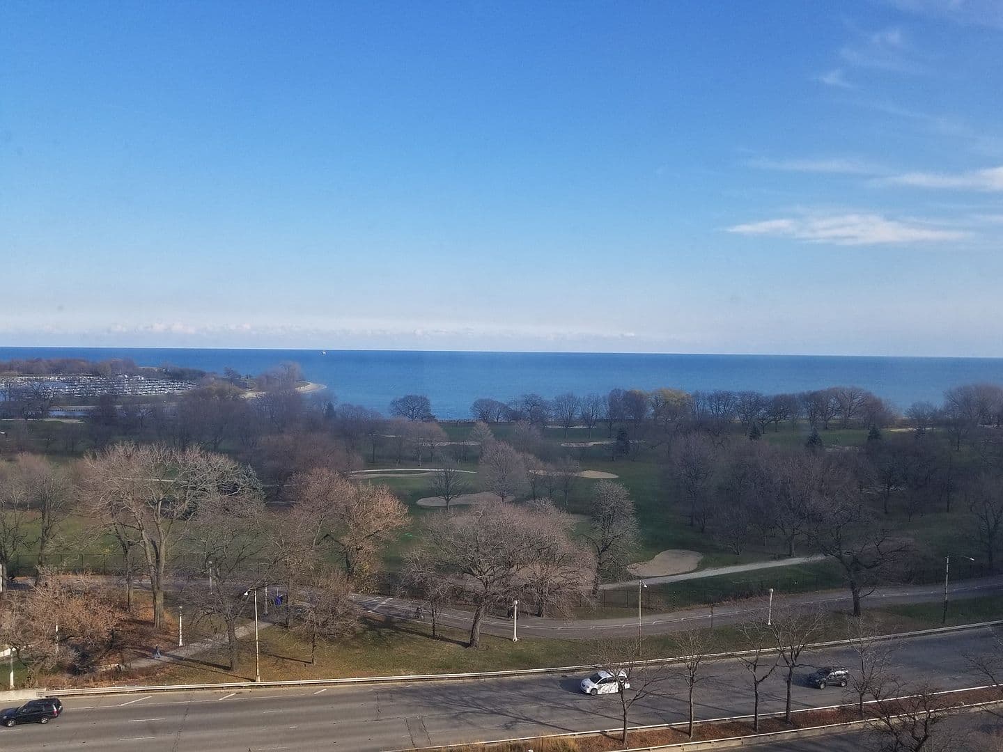 Lake Michigan and winding park paths fill the horizon.