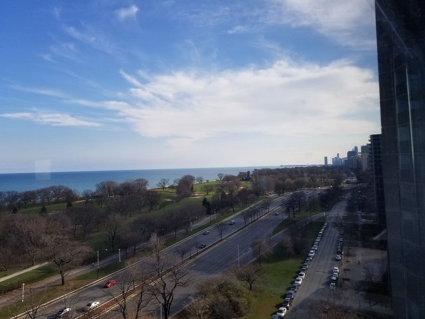 Lakefront greenery leads the eye toward Chicago’s skyline.