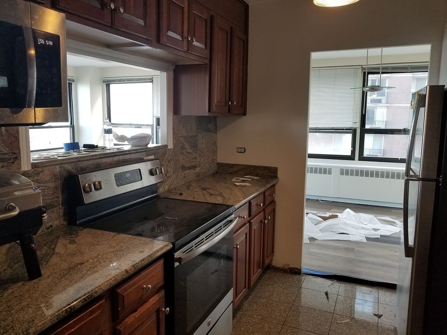 Kitchen pass-through keeps cooking connected to the living space.
