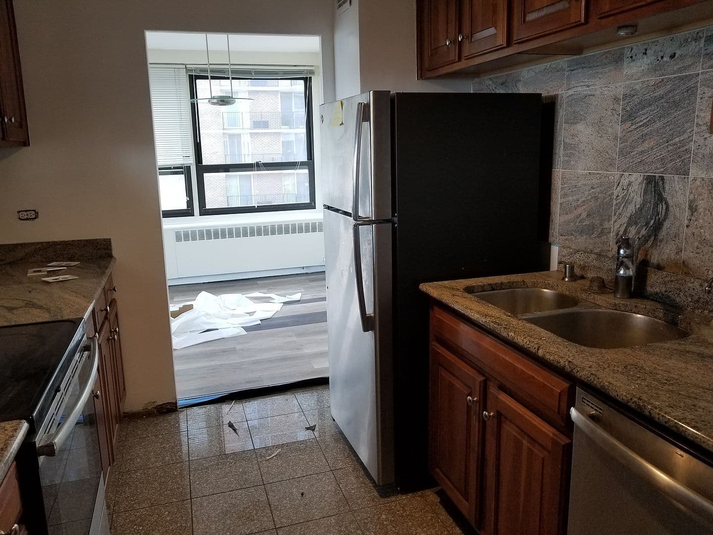 Double sink and dishwasher add everyday kitchen convenience.