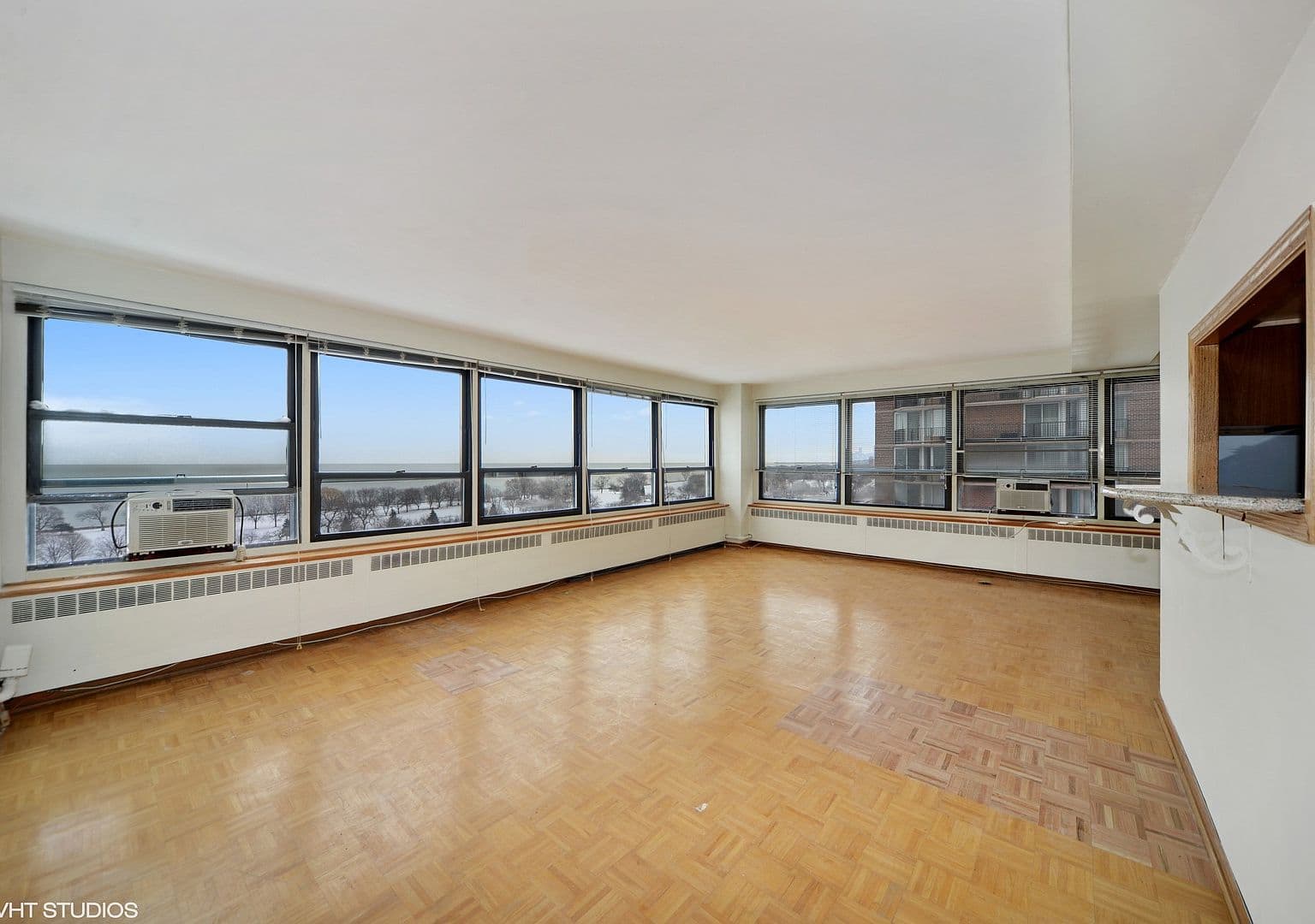Corner windows fill the living room with natural light