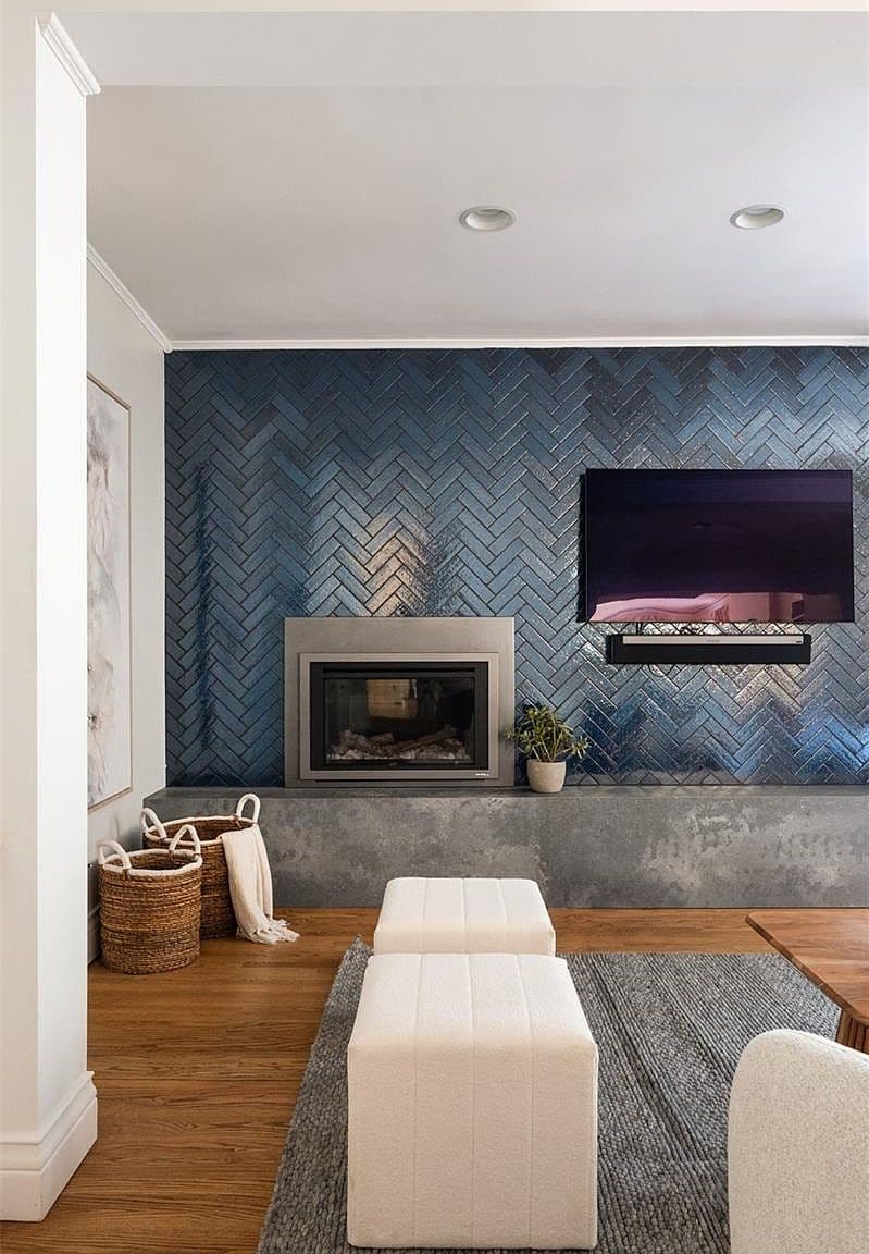 Family room built-ins flowing toward the kitchen
