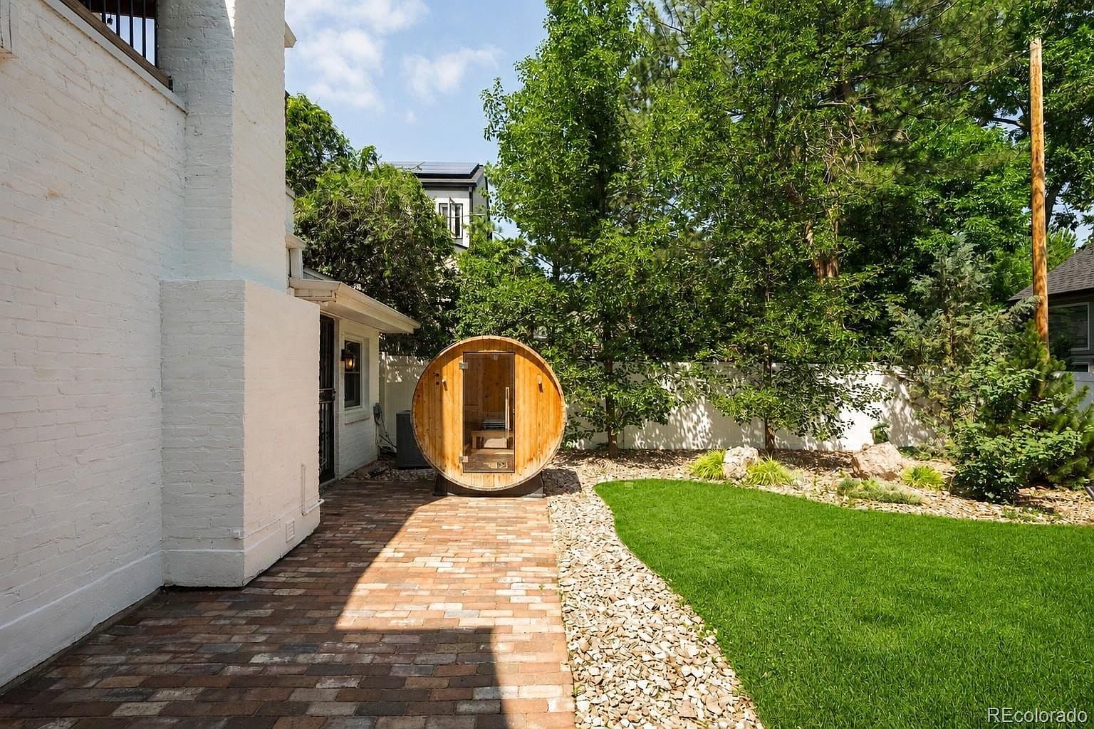 Brick-paver path to cedar barrel sauna