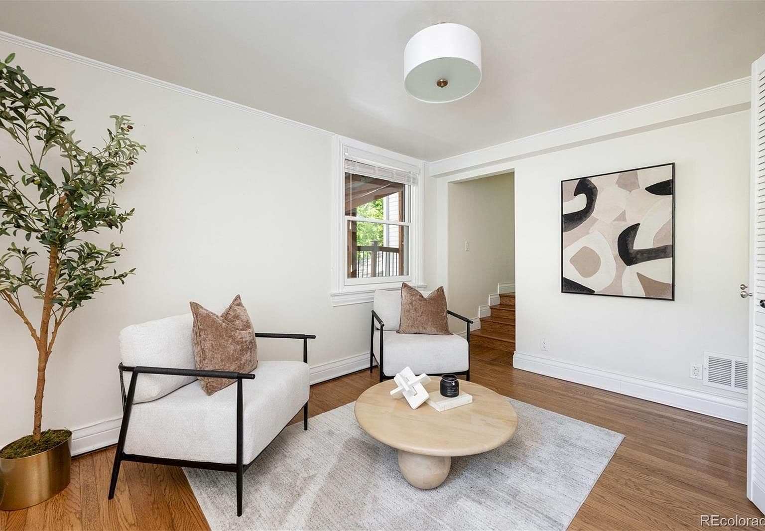 Cozy sitting room with sculptural coffee table