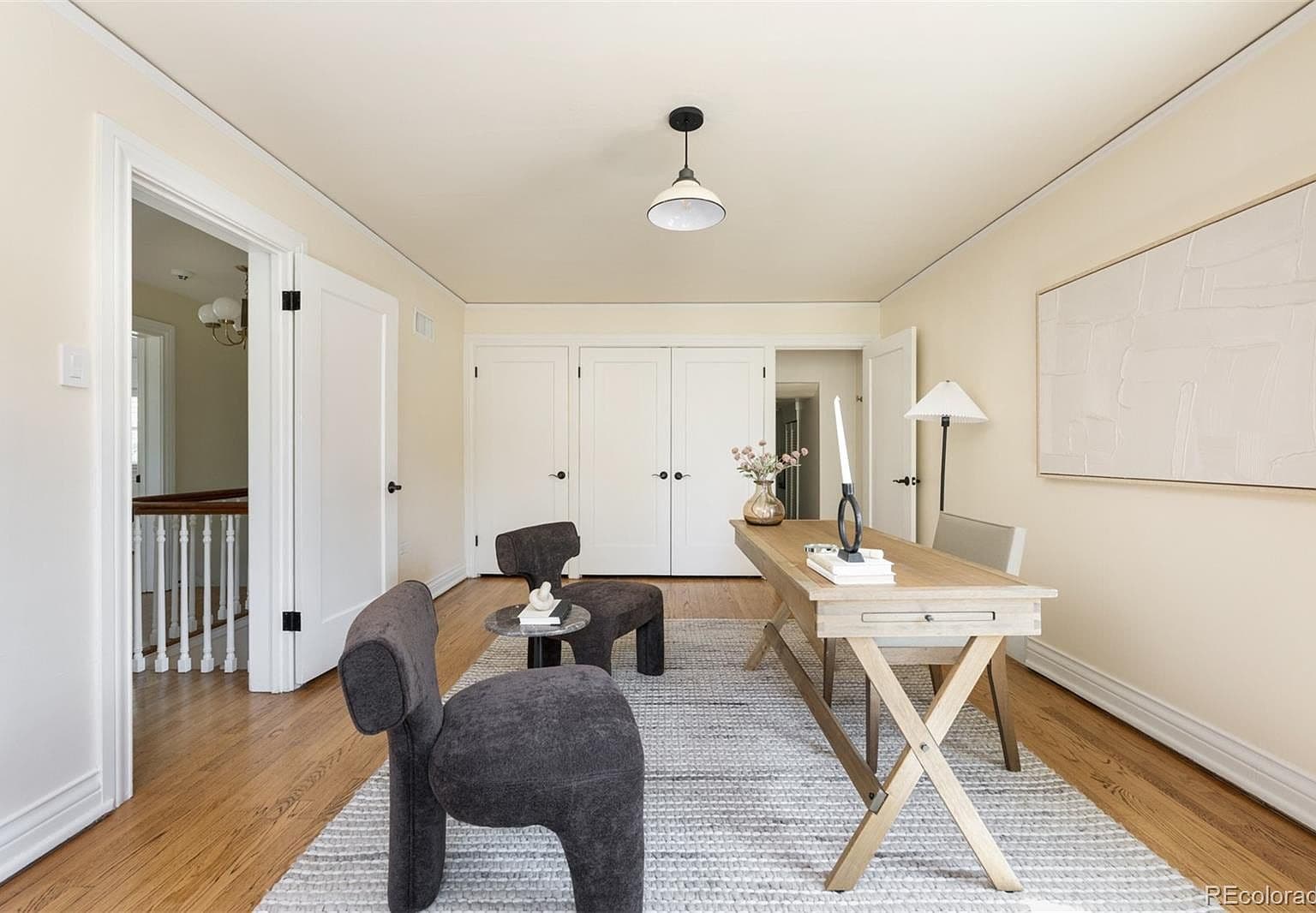 Flexible office space with desk and double closets