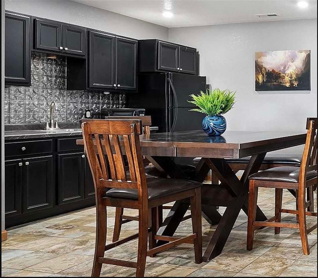 Sleek kitchenette and dining area for easy hosting.