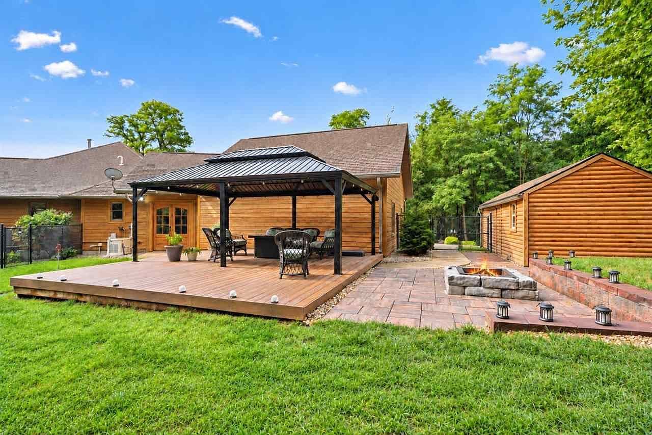 Composite deck and patio with gazebo, firepit lounge.
