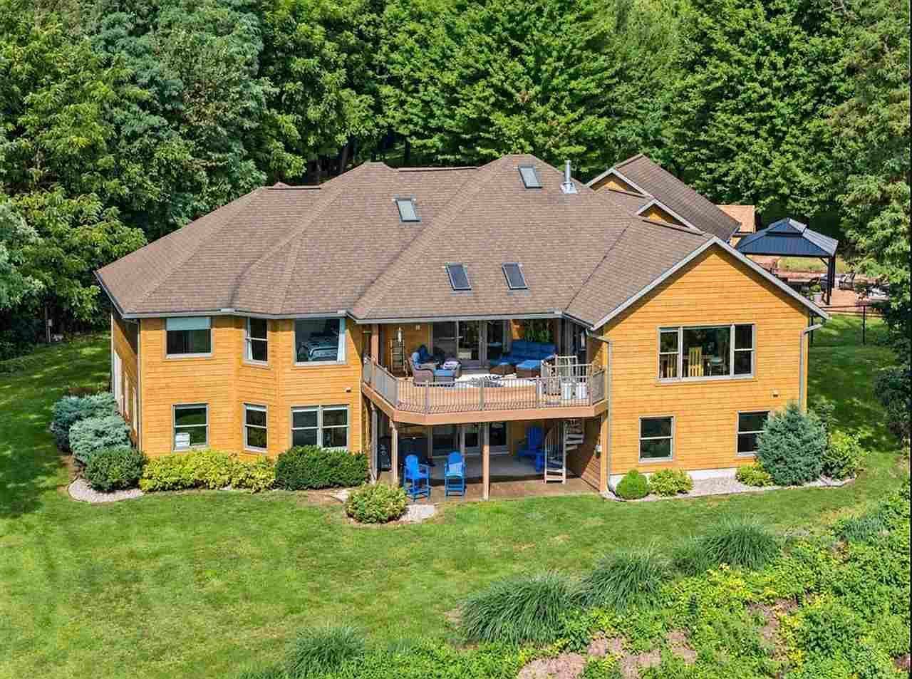 Spacious home tucked into lush, landscaped surroundings.